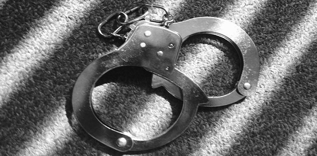 Man Arrested After Attempting to Set People’s Clothing on Fire at Toronto Transit Hub hand cuffs web 9