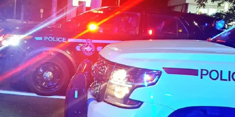 Oshawa Traffic Stop Leads to Drug Charges police cars night drug