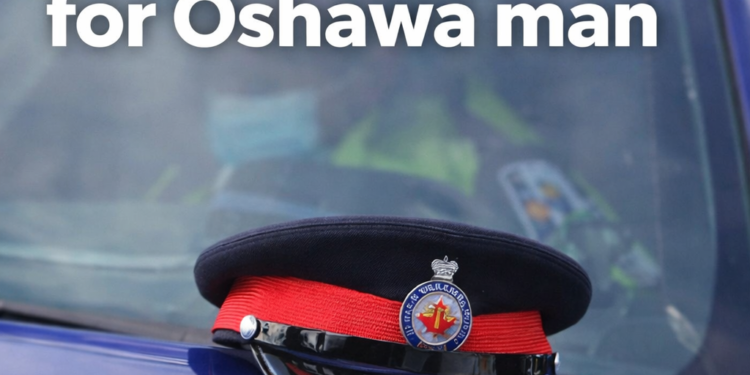 Durham Regional Police cap resting on a police vehicle in Oshawa