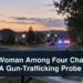 Ajax Woman Among Four Charged in GTA Gun-Trafficking Probe Neutral Ajax public-safety scene for a firearm-trafficking investigation with the headline Ajax Woman Among Four Charged in GTA Gun-Trafficking Probe