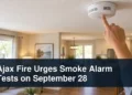 Smoke alarm test scene with the headline Ajax Fire Urges Smoke Alarm Tests on September 28