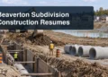 Subdivision infrastructure work with the headline Beaverton Subdivision Construction Resumes