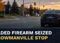 Unbranded roadside traffic-stop scene with the headline Loaded Firearm Seized in Bowmanville Traffic Stop
