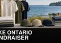 Lake Ontario shoreline with neutral fundraising apparel display