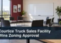 Truck service facility scene with the headline Courtice Truck Sales Facility Wins Zoning Approval