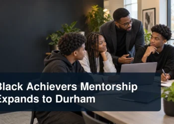 Black mentors and students in a workshop with the headline Black Achievers Mentorship Expands to Durham
