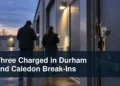 Commercial doorway investigation scene with the headline Three Charged in Durham and Caledon Break-Ins
