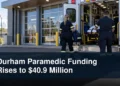 Durham Paramedic Funding Rises to $40.9 Million Paramedics preparing an ambulance with the headline Durham Paramedic Funding Rises to $40.9 Million