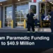 Paramedics preparing an ambulance with the headline Durham Paramedic Funding Rises to $40.9 Million