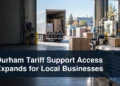 Durham manufacturing and shipping scene with the headline Durham Tariff Support Access Expands for Local Businesses