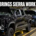 Pickup trucks moving through an auto assembly line representing new GM Oshawa Sierra production