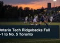 Women’s university soccer match with the headline Ontario Tech Ridgebacks Fall 2-1 to No. 5 Toronto