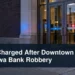 Unbranded downtown bank entrance with the headline Man Charged After Downtown Oshawa Bank Robbery