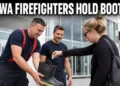 Oshawa firefighters collecting donations in a boot outside a shopping centre