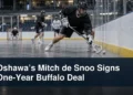 Generic box-lacrosse defender during an indoor drill with the headline Oshawa’s Mitch de Snoo Signs One-Year Buffalo Deal