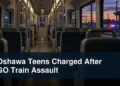 Oshawa Teens Charged After GO Train Assault Empty commuter train after a reported incident with the headline Oshawa Teens Charged After GO Train Assault