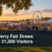 Port Perry Fair Draws About 21,000 Visitors Busy agricultural fair at sunset with the headline Port Perry Fair Draws About 21,000 Visitors