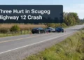 Three vehicles stopped on a rural road with the headline Three Hurt in Scugog Highway 12 Crash