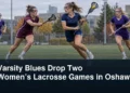 Women’s university field lacrosse game in Oshawa with the headline Varsity Blues Drop Two Women’s Lacrosse Games in Oshawa