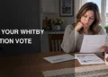 Voter reviewing a sample ballot at home representing Whitby election voting options