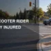Neutral road-safety illustration of a mobility scooter rider at a Whitby intersection