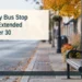 Port Perry Bus Stop Closure Extended to October 30 AI editorial illustration: Empty transit-stop bench beside an autumn street. Headline: Port Perry Bus Stop Closure Extended to October 30. AllAboutDurham.com.