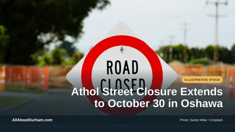 Illustrative stock photo: A road-closed sign on a street. Photo by Sandy Millar on Unsplash. Headline: Athol Street Closure Extends to October 30 in Oshawa. AllAboutDurham.com.
