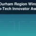 Abstract technology illustration with the headline Durham Region Wins Info-Tech Innovator Award